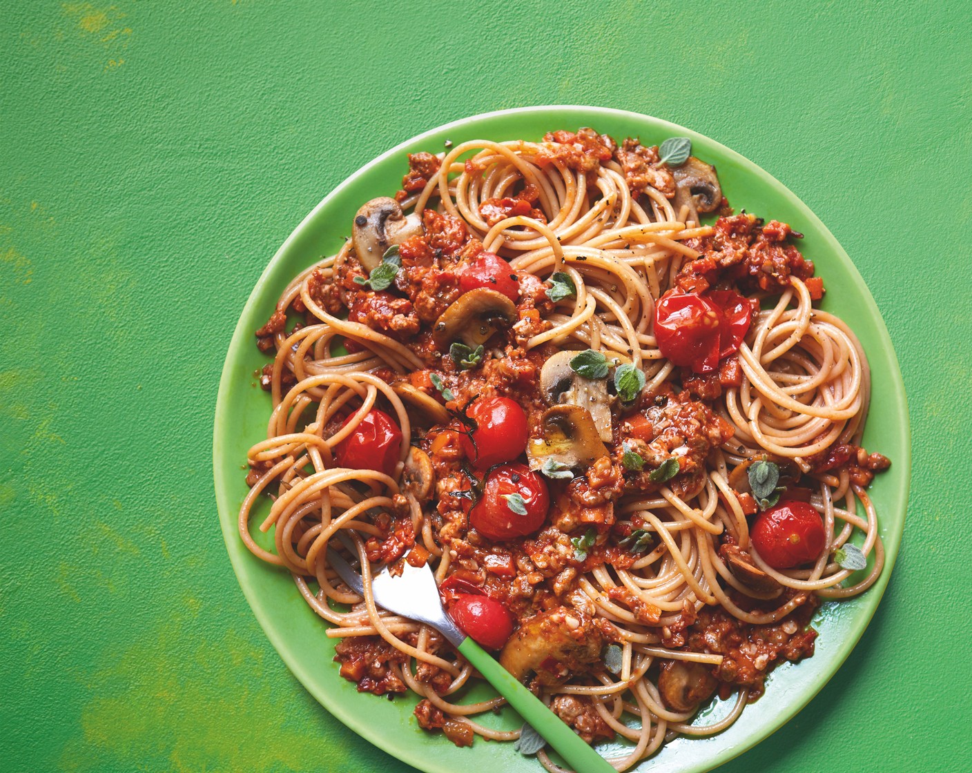 step 5 Drain the pasta and toss into the sauce, then stir in the roasted mushrooms and tomatoes. Serve with some fresh oregano (5 g) on top.