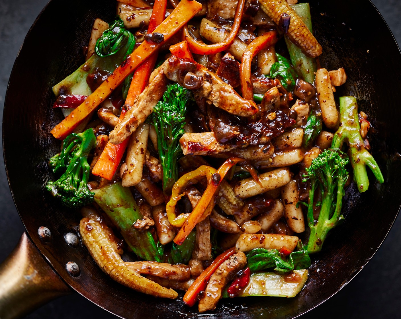 step 2 Add the vegetables (300 g), tteokbokki (230 g), black bean sauce (150 g) and cook for 5-7 minutes, or until the veg is tender and the tteokbokki is soft then serve in bowls.