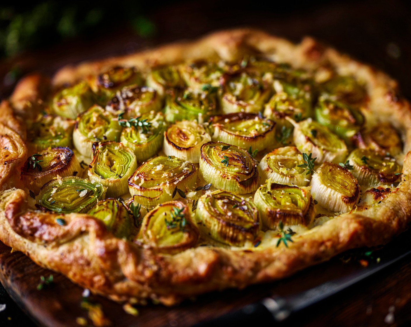 step 12 Bake for 20-25 minutes, until the pastry is golden brown and crisp and the potatoes are tender. Finish with a scattering of fresh thyme leaves and a grating of lemon zest.