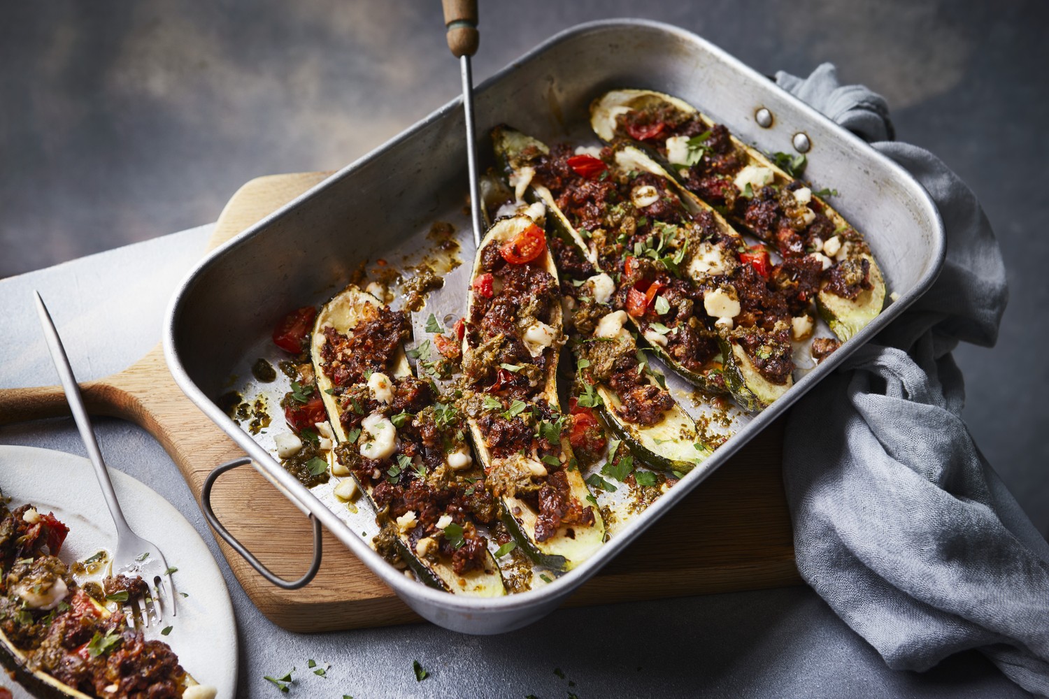 Stuffed courgettes with crispy harissa mince