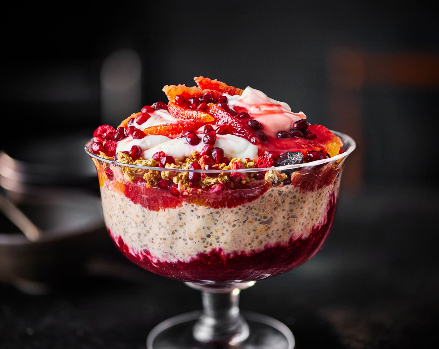 step 5 Spoon over the remaining yogurt (300 g), then top with the remaining orange segments (2), pomegranate rubies (75 g), and granola (75 g). Serve immediately.