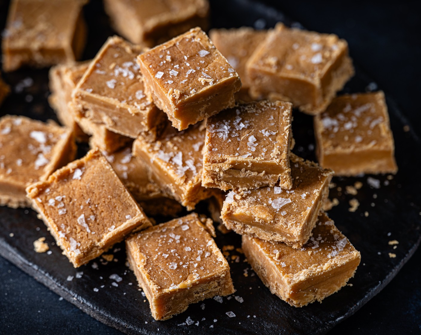 step 5 Once set, turn the fudge out onto a chopping board and cut into 36 pieces using a sharp knife. The fudge can be stored in an air-tight container in the fridge for up to 1 month, or in a cool place for 1-2 weeks.
