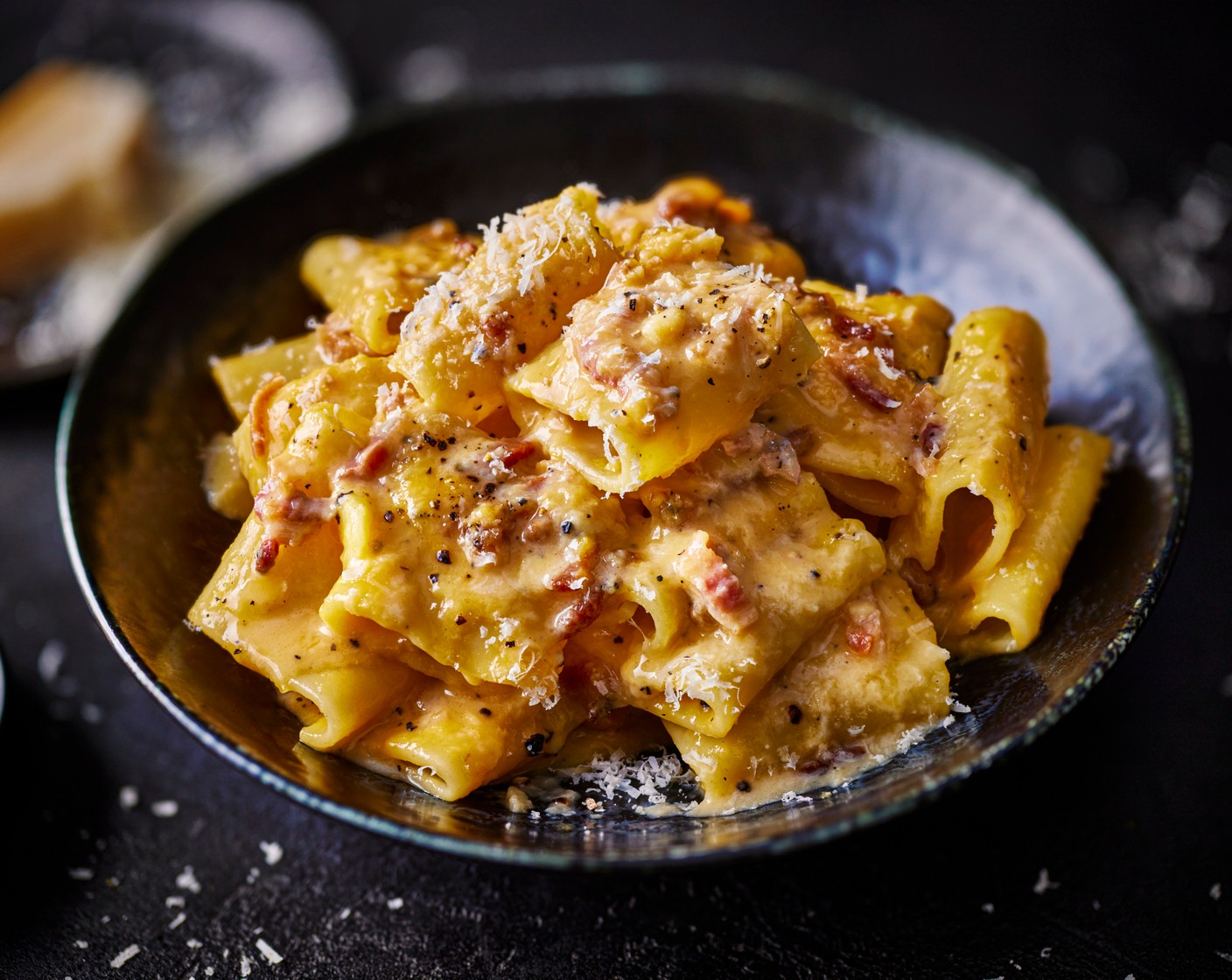 step 6 Once the pasta is coated, add it back to the heat and cook for a further minute to heat through. Serve immediately with some extra parmesan and black pepper.