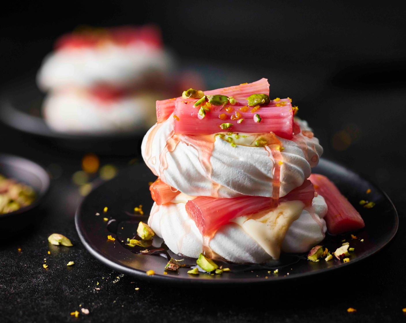 step 6 Spoon over some of the rhubarb cooking liquid and scatter over the chopped pistachios (30 g) and orange zest.