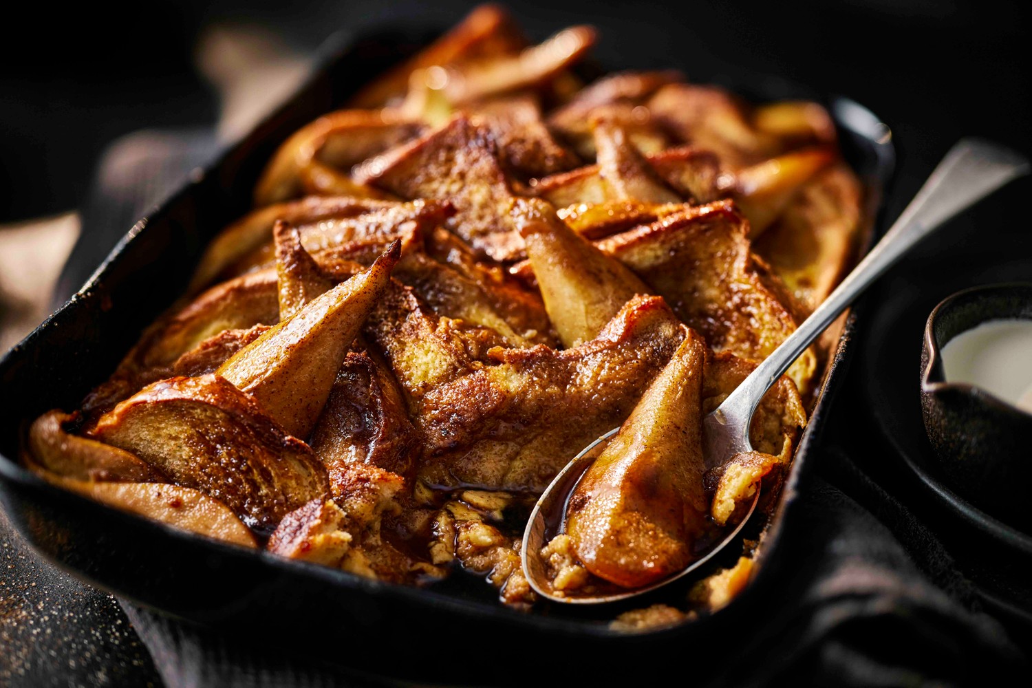 Sticky toffee pear bread and butter pudding