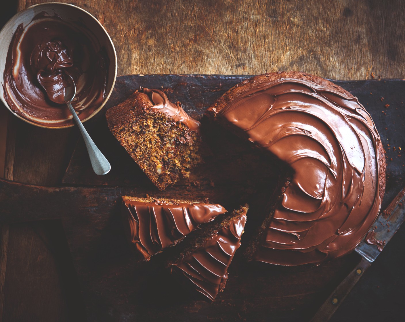 step 6 Allow the cake to cool a little in the tin, then remove it from the tin and allow to cool completely. Spread the M&S Collection Italian chocolate hazelnut crème (3 tbsp) over the top of the cake, if using, then slice and enjoy.