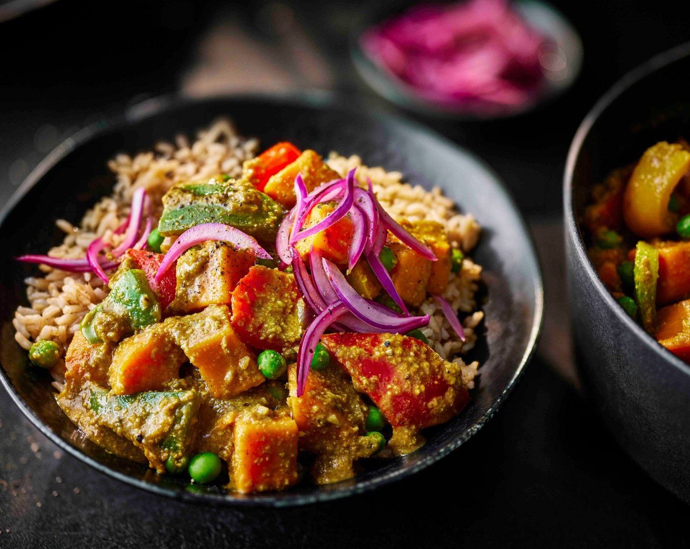 step 6 Serve the korma with the wholegrain rice, topped with the pickled onions.