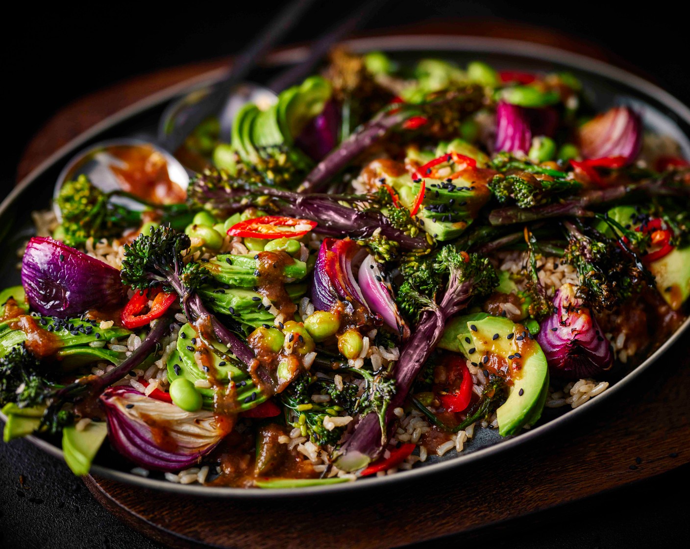 step 4 Top with the sliced chilli (1) and sesame seeds (1 tbsp) and serve.