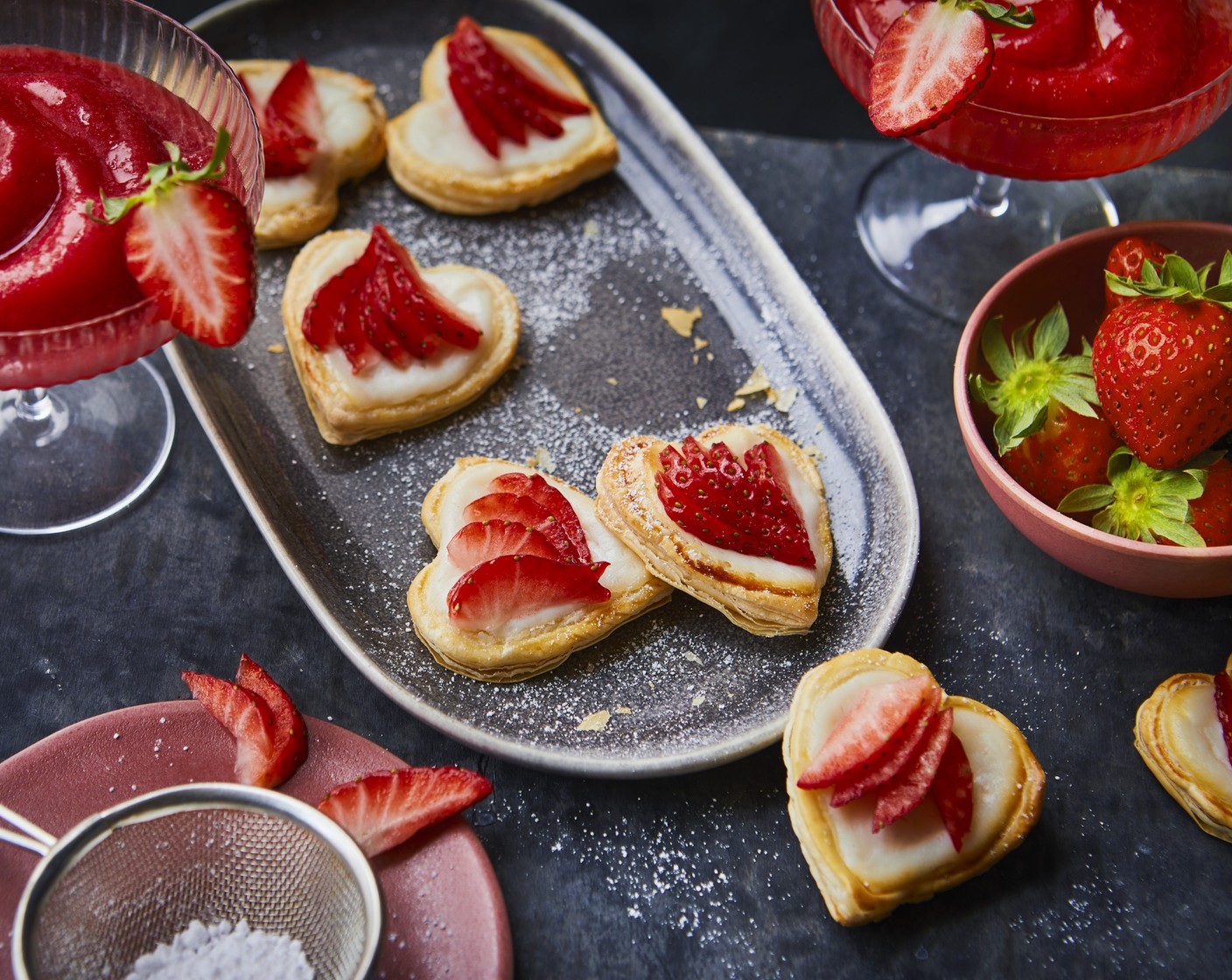 step 9 Bake for 15-20 minutes until your tarts puff up and there are no soggy bottoms. Cool on a rack and garnish with sliced strawberries (as needed) and a final sprinkle of icing sugar. Enjoy with all your loves.