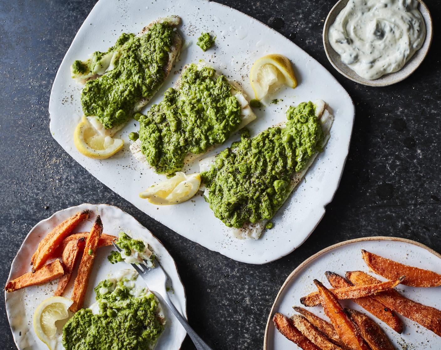 step 6 To serve, plate up the cod and sweet potato chips with a dollop of M&S tartare sauce (as needed) and wedges of M&S Remarksable Value lemon (1) for squeezing.