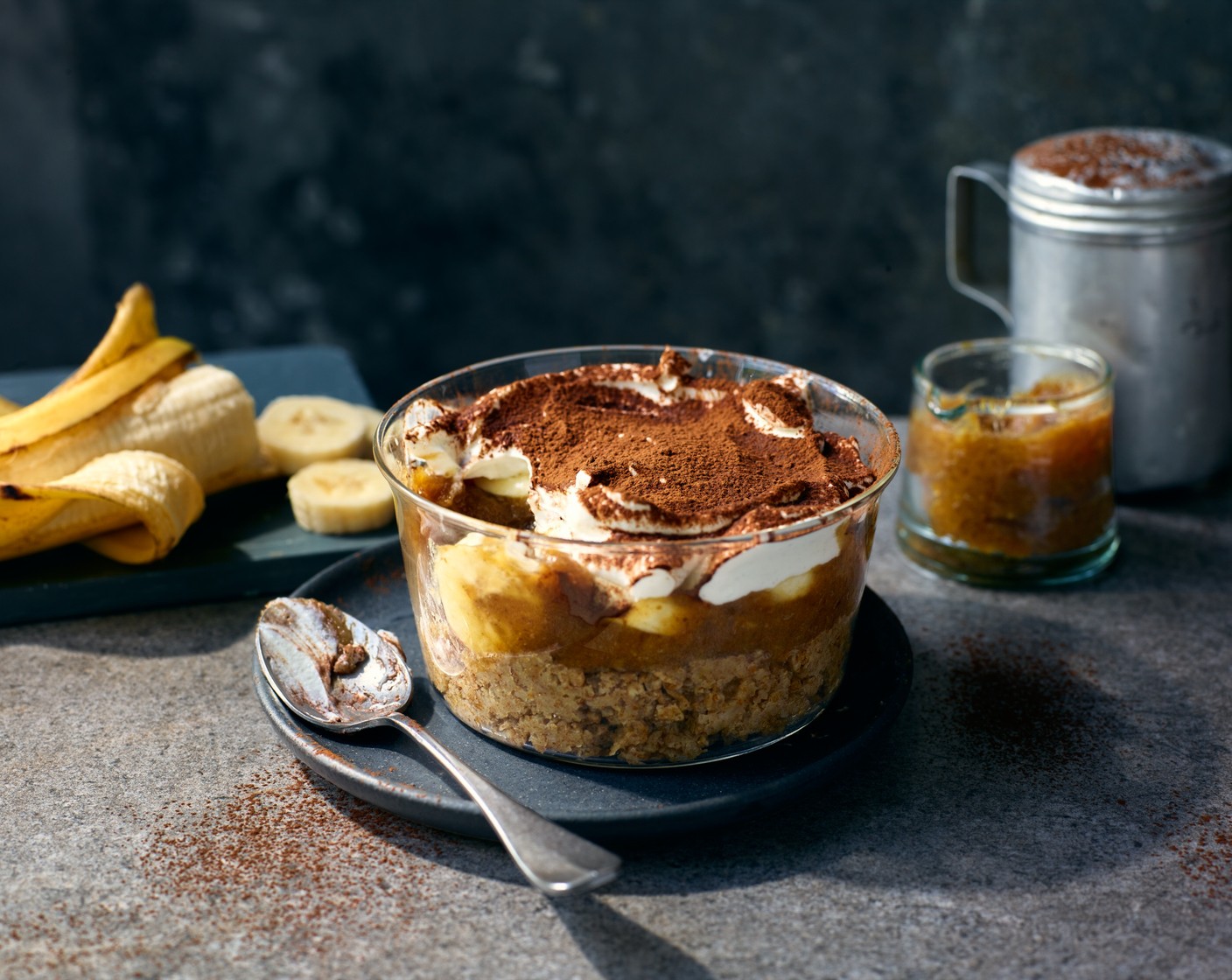 step 3 Spread 1 heaped tbsp of the date caramel over the bisks, top with slices of banana (1) and finish with the M&S High Protein vanilla yogurt (1 pot). Dust over a little cocoa powder (as needed) and enjoy immediately or store for up to two days.
