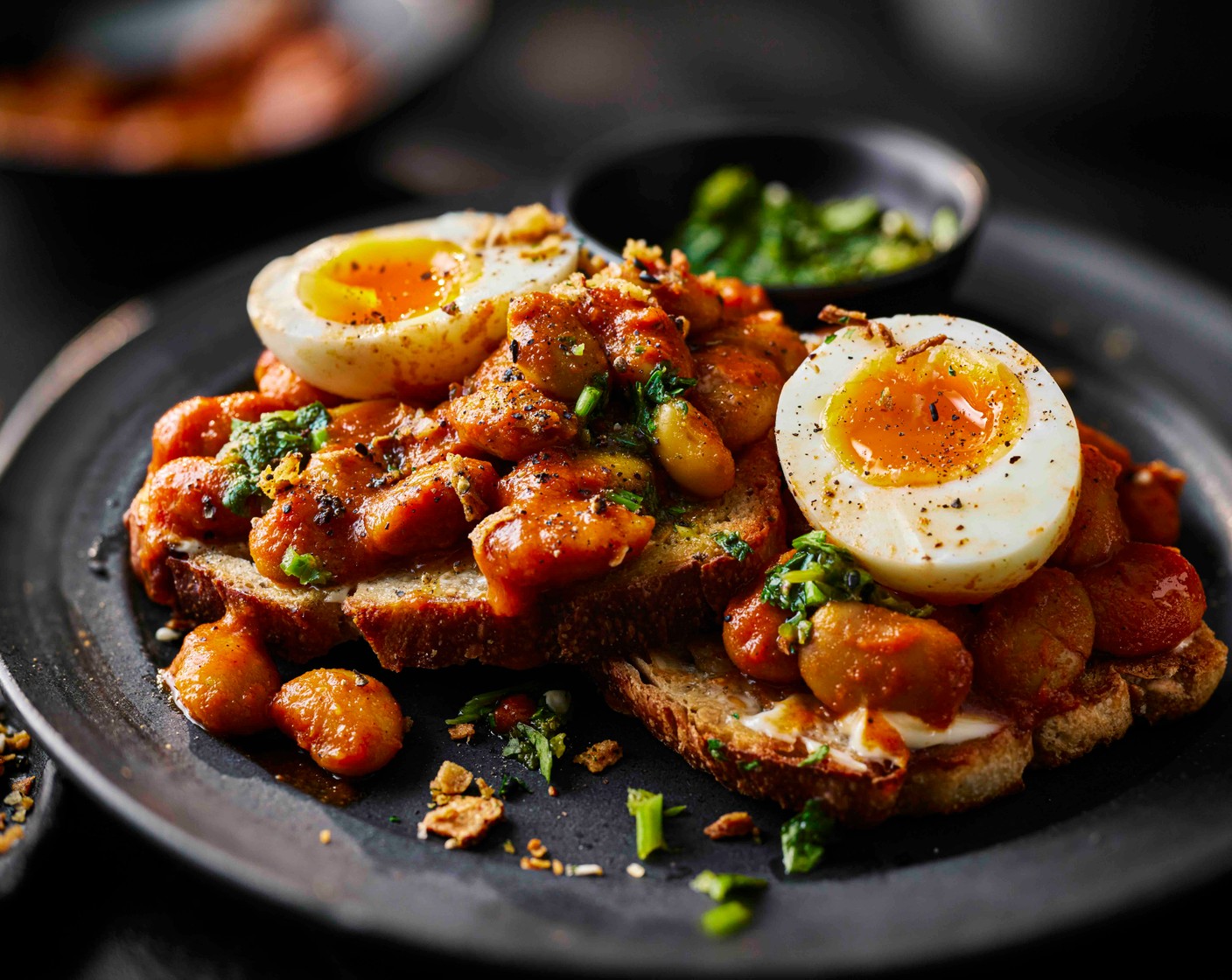 step 5 Top the toast with the beans, eggs, chutney and top that seasoning (2 tsp). Finish with a few extra coriander leaves, if you like.