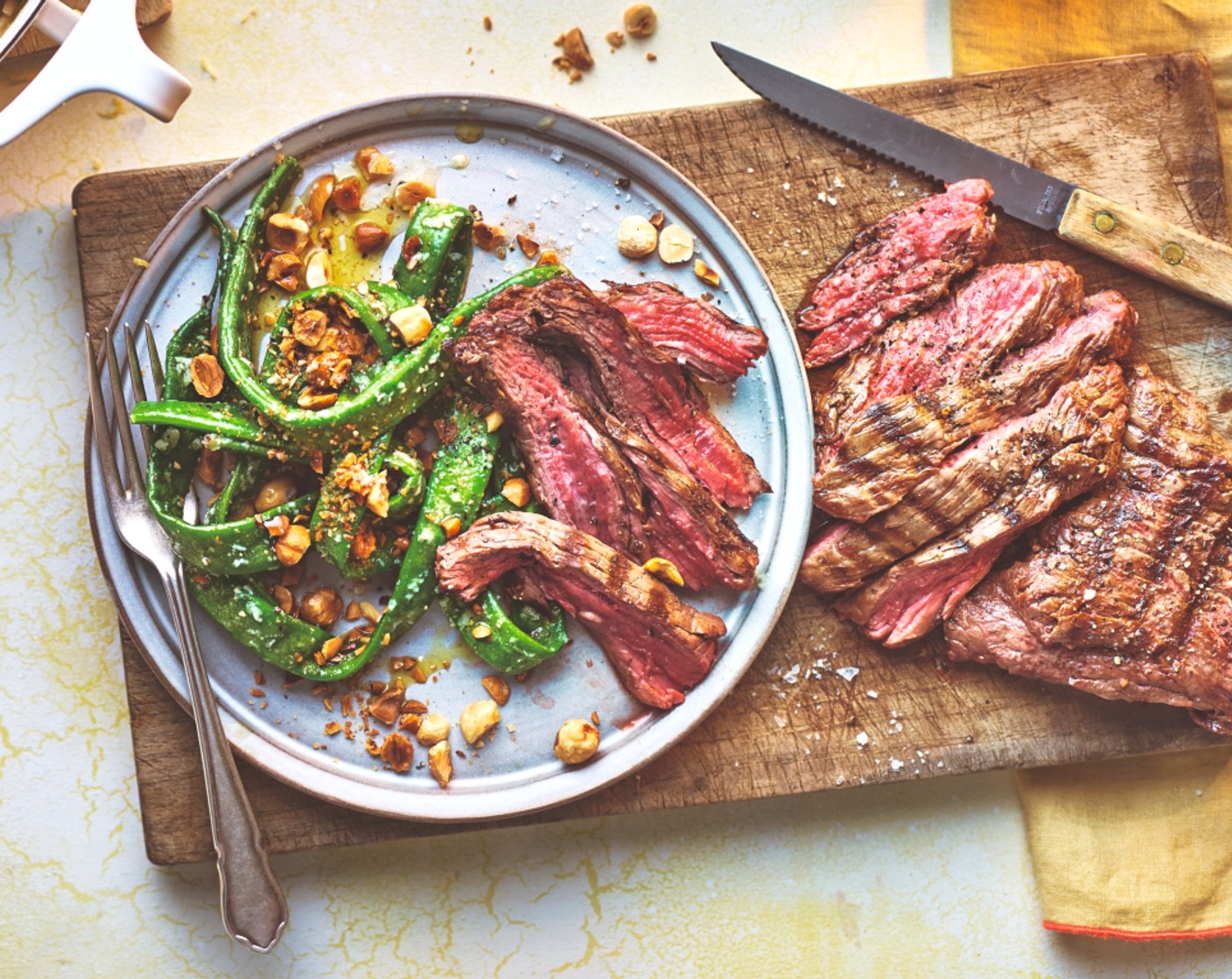 step 5 Toss the runner beans in the dressing and serve alongside the sliced steak.