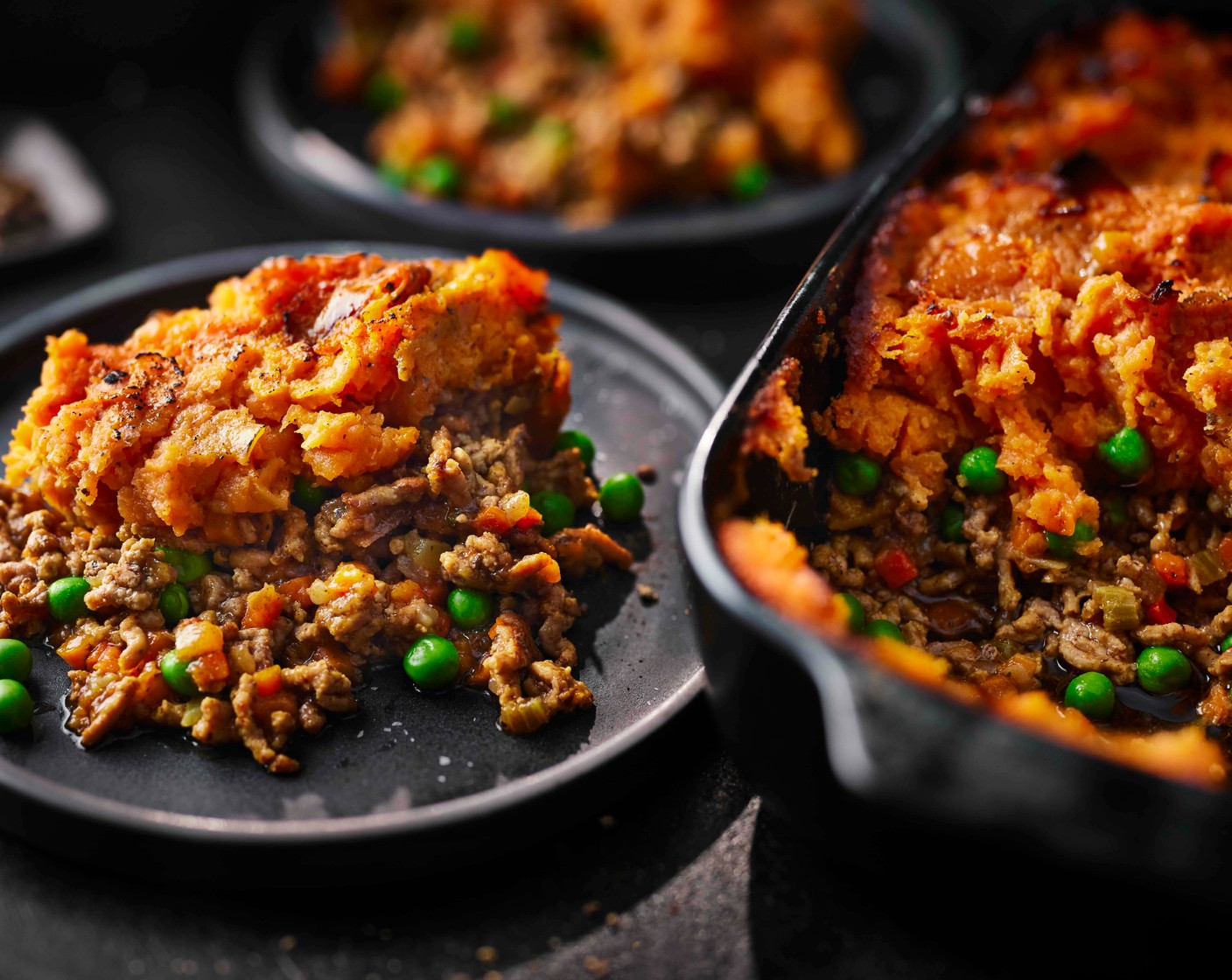 step 4 Preheat the oven to 200°C/180°C fan/gas mark 6. Mash the potato with a little olive oil and season to taste with salt and pepper. Add a glug of milk if you prefer it slightly looser. Spoon the sweet potato mash on top of the lamb mince and smooth with the back of a spoon or spatula. Bake for 20 minutes, until golden brown on top.