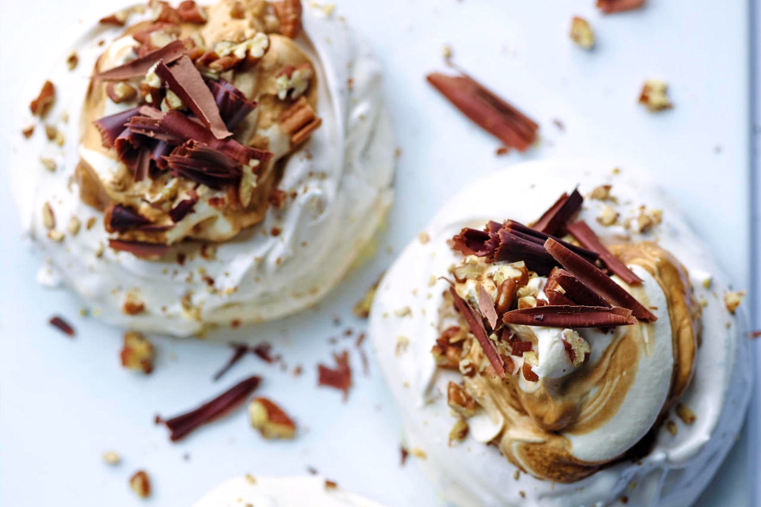 Coffee cream pecan pavlovas