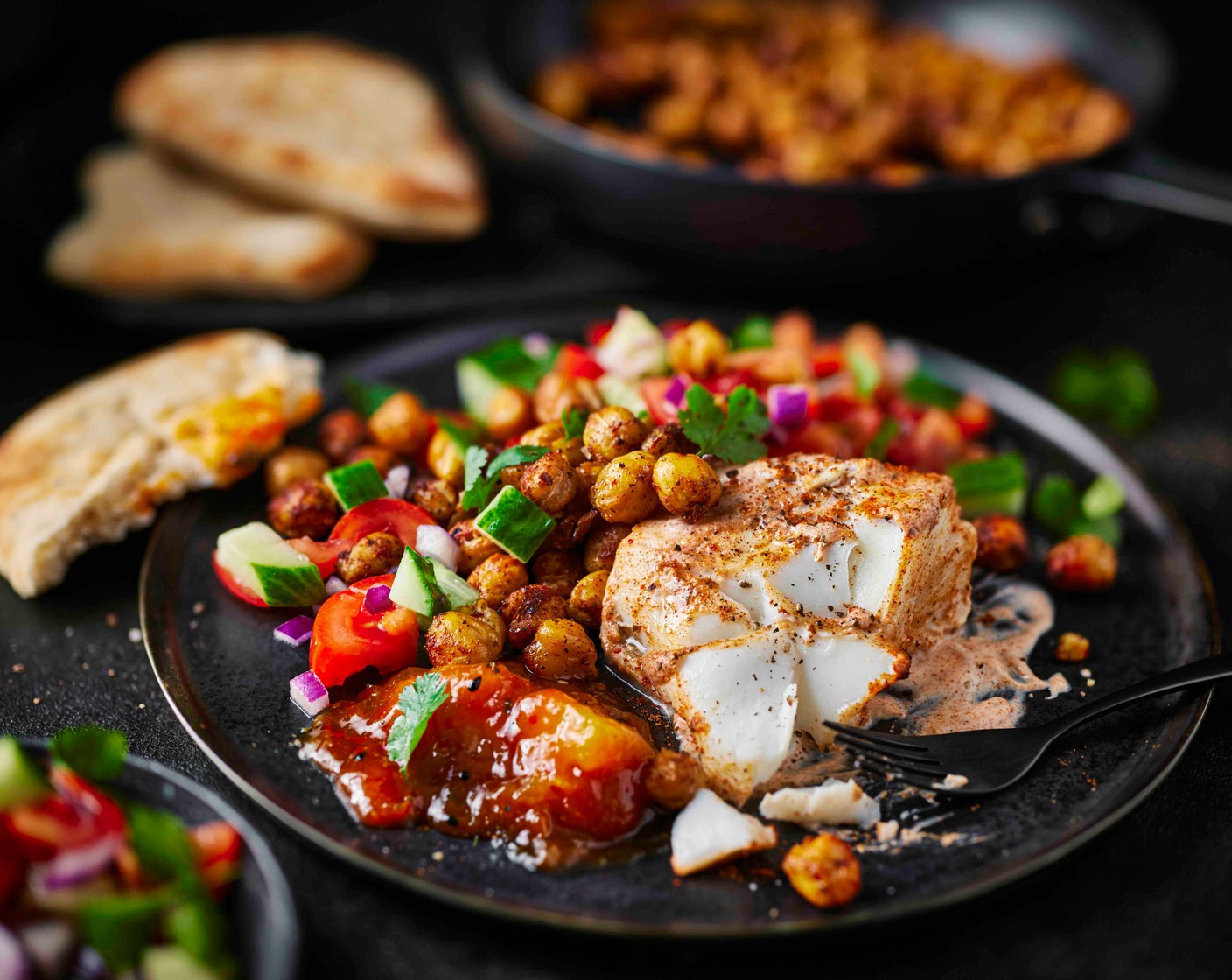 step 6 Serve the fish with the naan breads, salad and crispy chickpeas, with mango chutney (as needed) on the side.