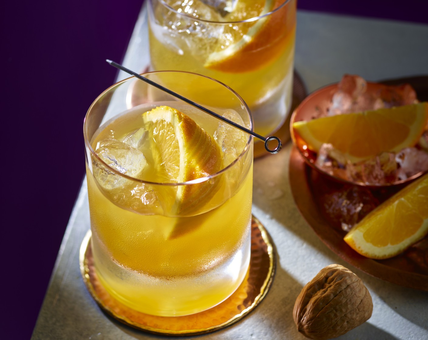 step 2 Add brandy (25 ml), lime juice (2 tsp), amaretto (25 ml) and clementine juice (2 tsp) and stir to combine. Garnish with an orange wedge (as needed).