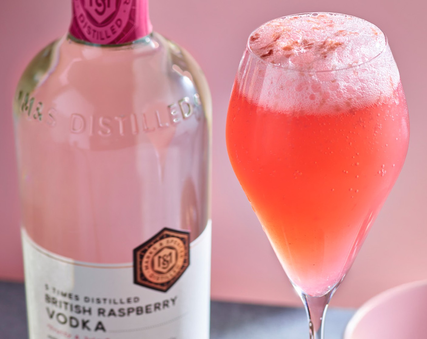 step 2 Top up with the prosecco (200 ml) and garnish with the raspberries (to taste).