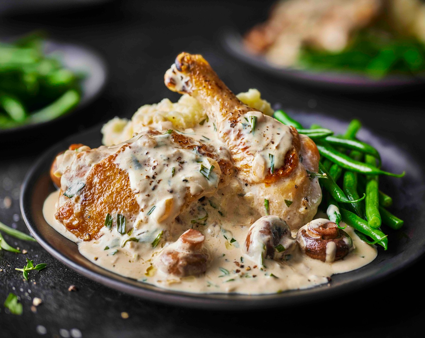 step 9 Serve the mash on plates and top with the chicken fricassee and sauce, with the green beans on the side.