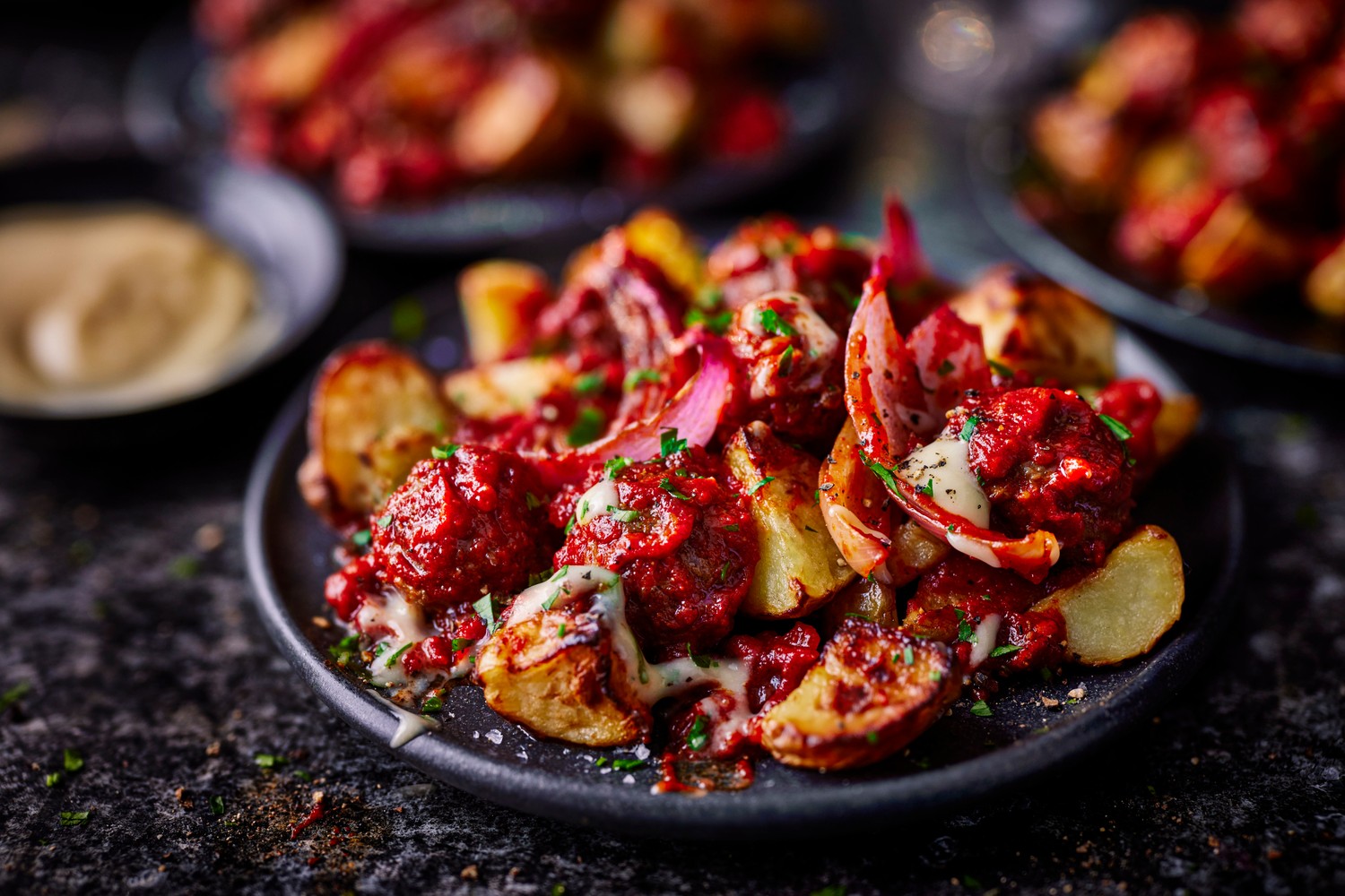Meatballs and patatas bravas traybake