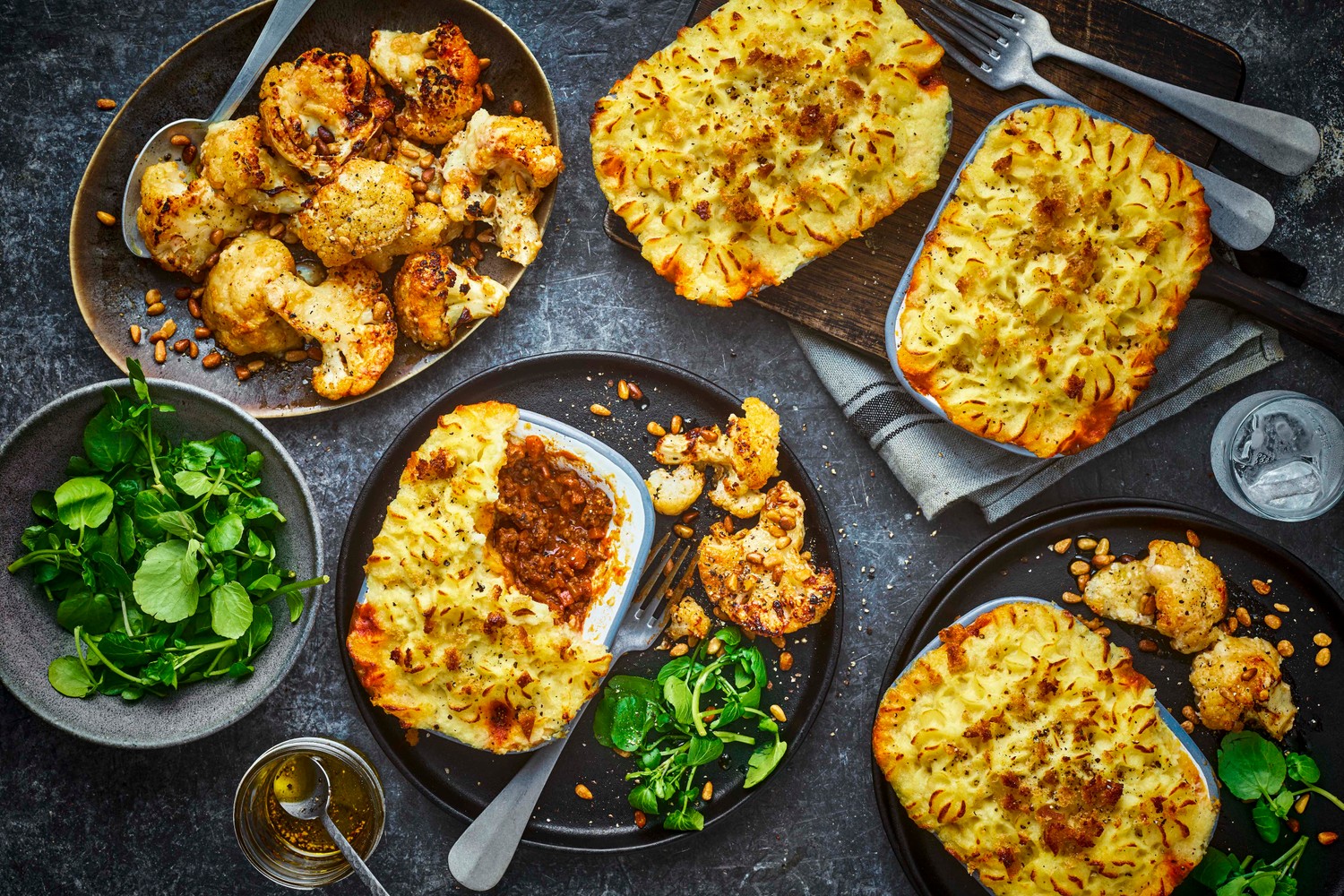 Cottage pie with roasted cheesy spiced cauliflower and watercress salad