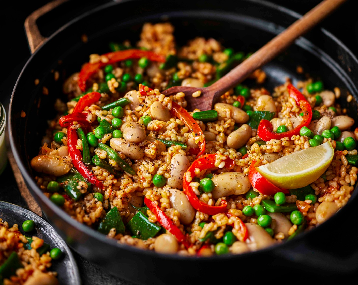 step 8 Serve the paella in bowls with a dollop of yogurt aioli.