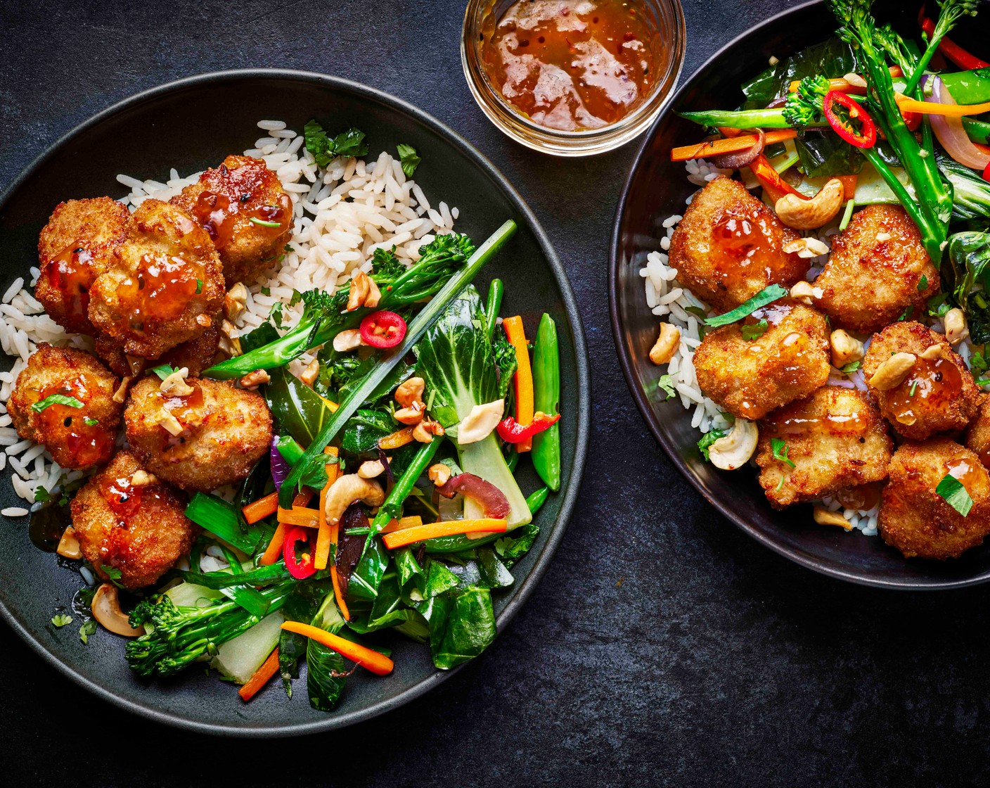 step 3 Cook the rice (1 pack) according to pack instructions and load it into bowls before spooning in the sticky mango chutney chicken and cooked veg. Scatter with the coriander (as needed), before drizzling over more mango chutney and finishing with the cashews (as needed).