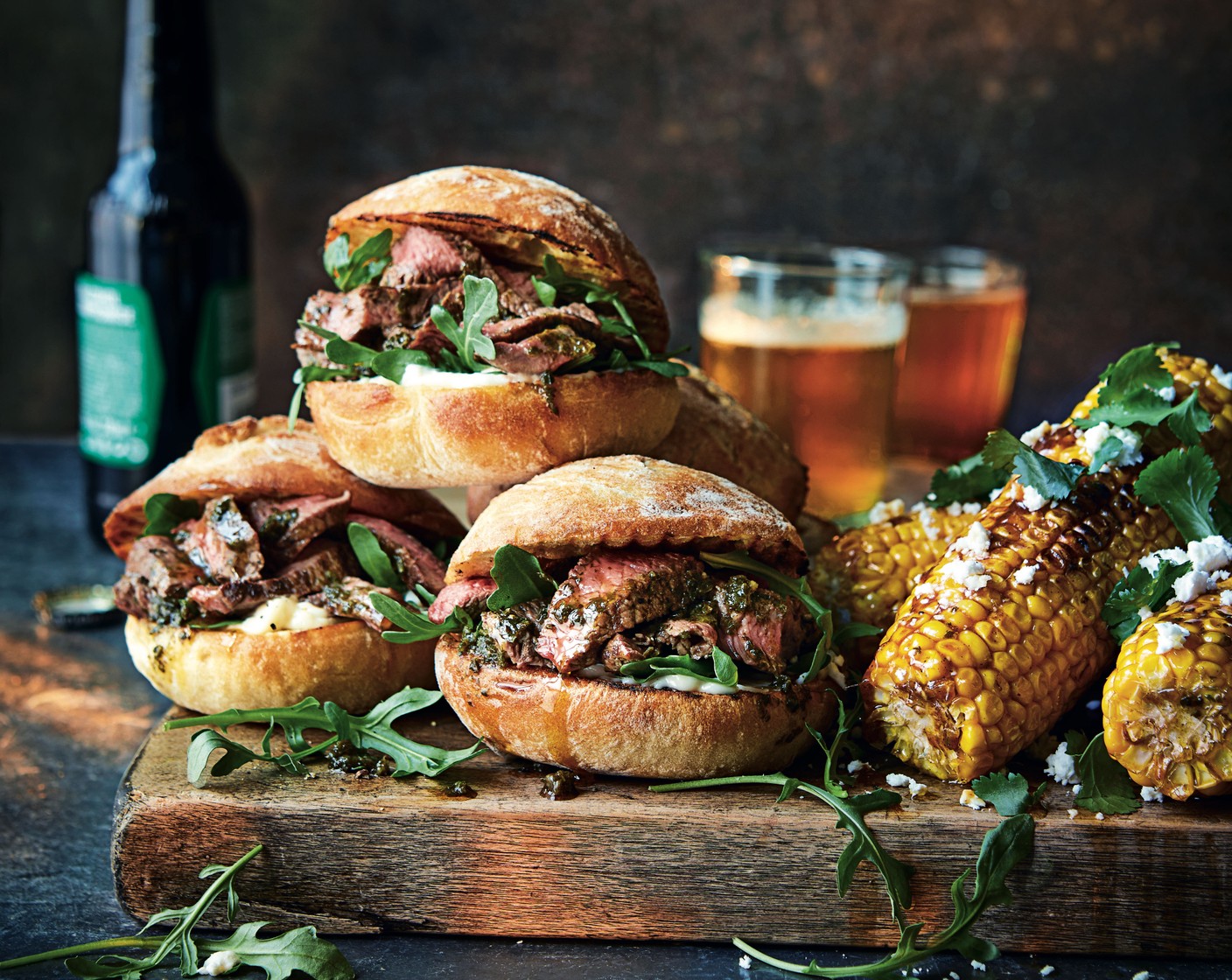 step 5 Spread some mayonnaise (2 tbsp) onto the base of each ciabatta, then layer on the steak, the rocket (50 g) and a generous drizzle of the chimichurri from the steak pack, then the other ciabatta halves. Serve the sandwiches along with the spicy corn.