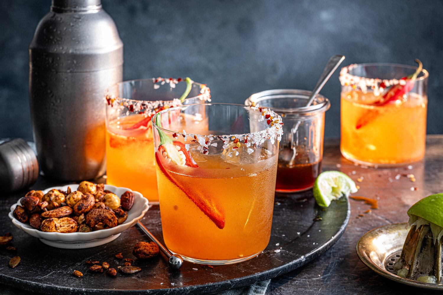 Hot honey margarita with roasted nuts and seeds