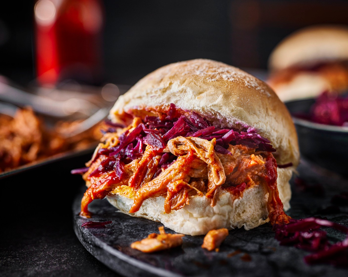 step 4 Cut the white baps (6) in half and stuff with the pulled pork and 1 heaped tablespoon of pickled red cabbage (6 tbsp) per bap. Eat straight away or wrap in foil and keep warm to enjoy during the fireworks.