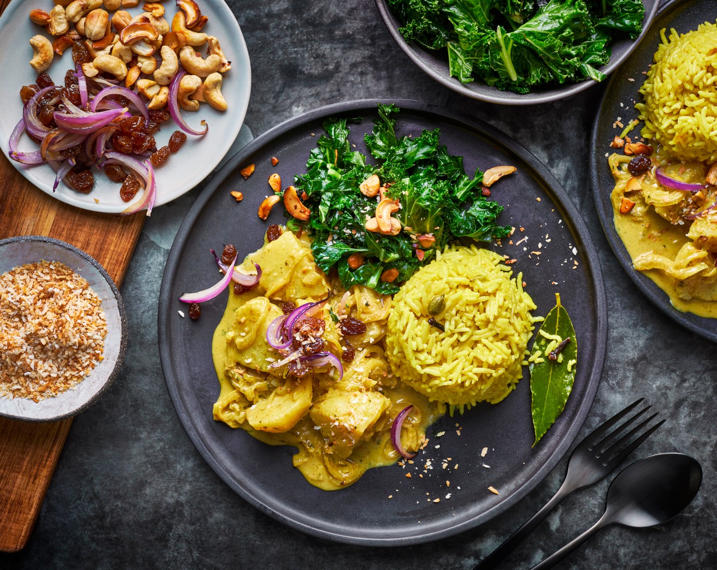 step 11 Serve the curry, kale and rice sprinkled with the cashew mix and the desiccated coconut (50 g).