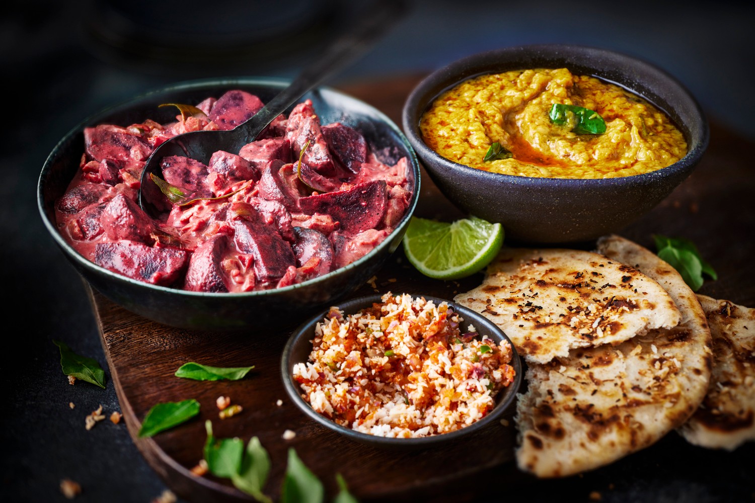 Sri Lankan-style beetroot curry with dal, pol roti and coconut sambol