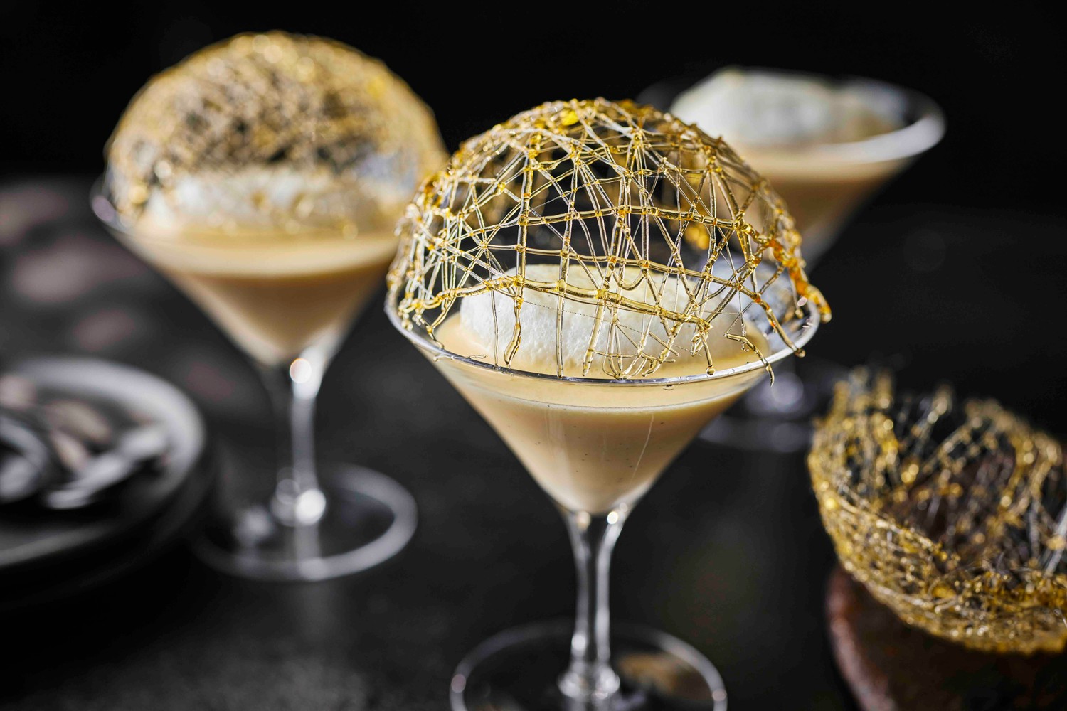 Floating Islands recipe: crème anglaise with poached meringues and caramel cages